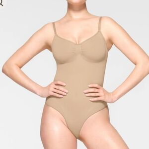 SKIMS seamless sculpt bodysuit brief in clay